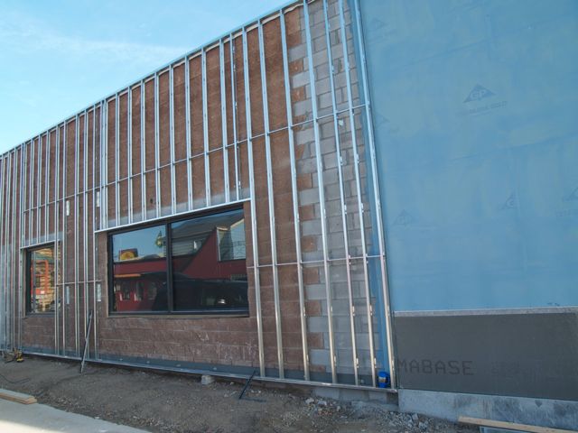 continuing studs continue over original brickwork