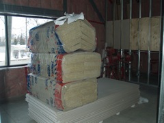 drywall and sound insullation await installation