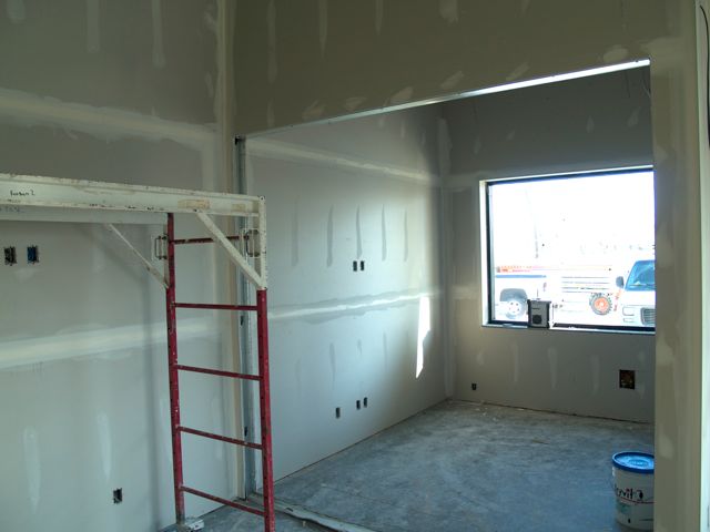 drywall is done - now with the tape and plaster