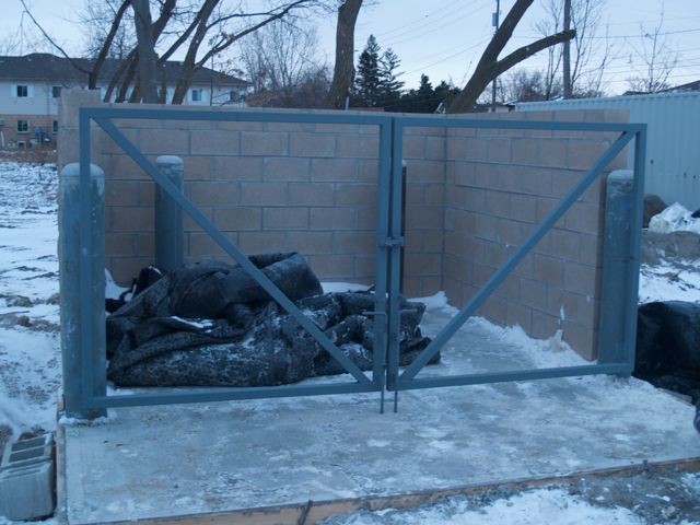 getting the gate installed on garbage containment area