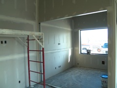 drywall is done - now with the tape and plaster