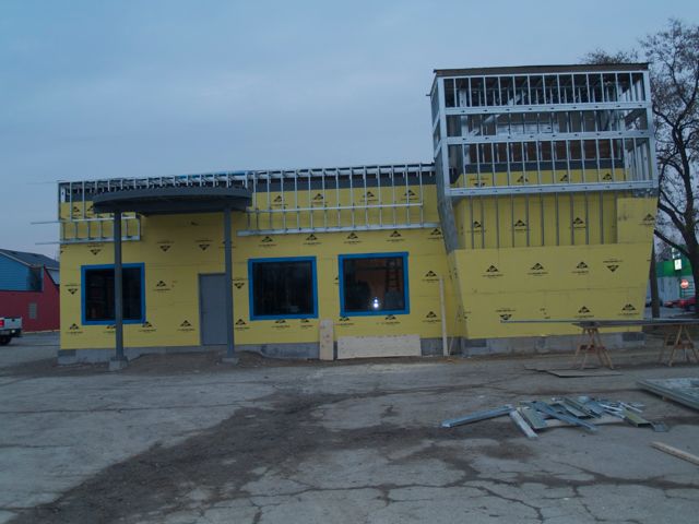 main entrance with facade nearing completion
