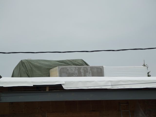 materials on roof await installation