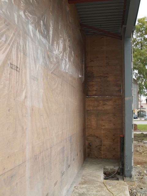 wall with plastic for weatherproofing