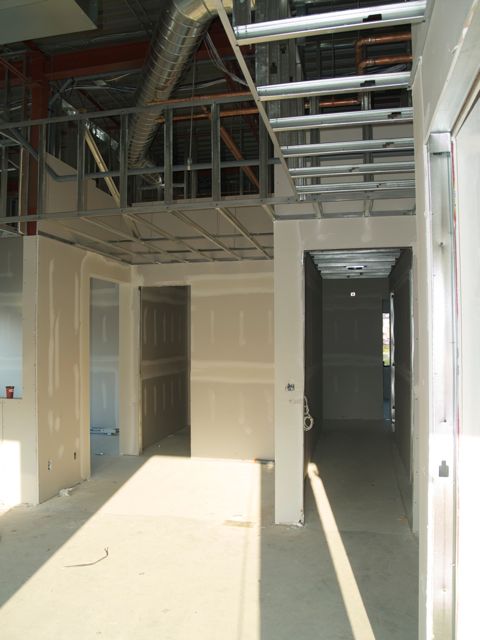 hall to customer service side on right and storage room in middle