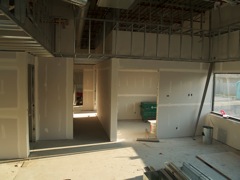 view toward kitchen (middle) and office from tech support