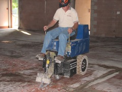 scraping the tile floor down